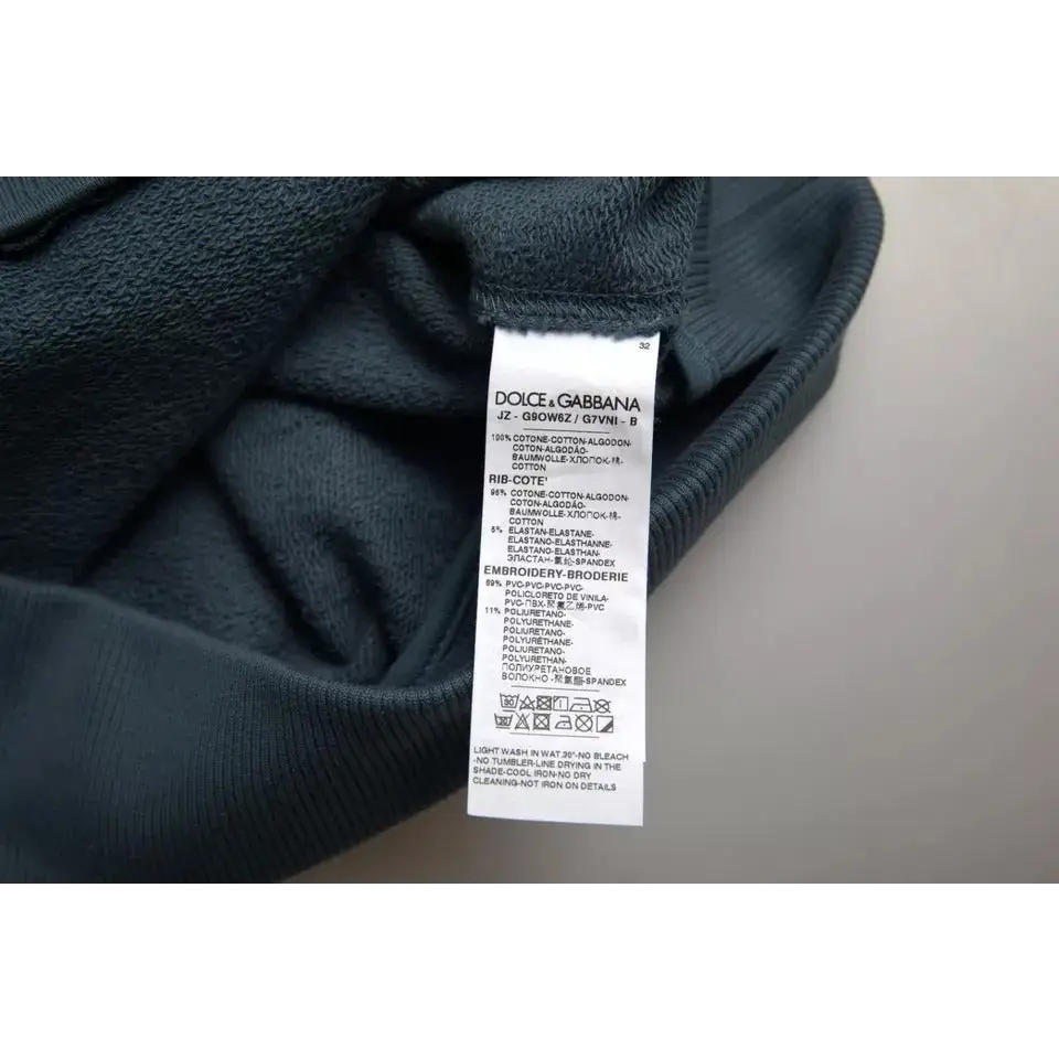 Dolce & Gabbana blå bomuld logo crew neck sweater med mørkegrøn ribbet etiket