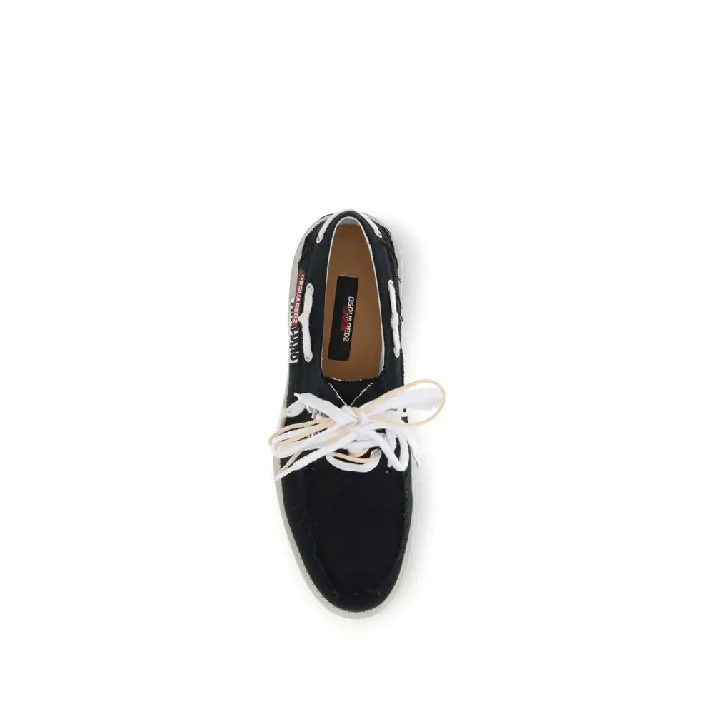 Sorte Dsquared² boat shoes i sort canvas med hvide snører og subtilt grafisk print på siden