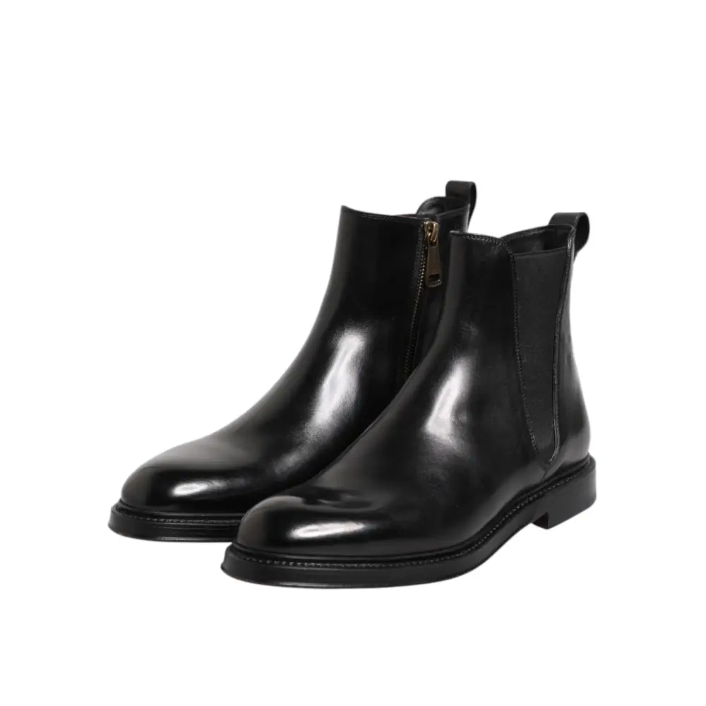 Dolce & Gabbana gabbana black chelsea black chelsea leather mid calf boots med blankpoleret læderfinish og elastiksidepaneler