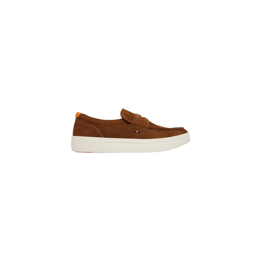 Brown Tommy Hilfiger suede loafers with a light sole, side view