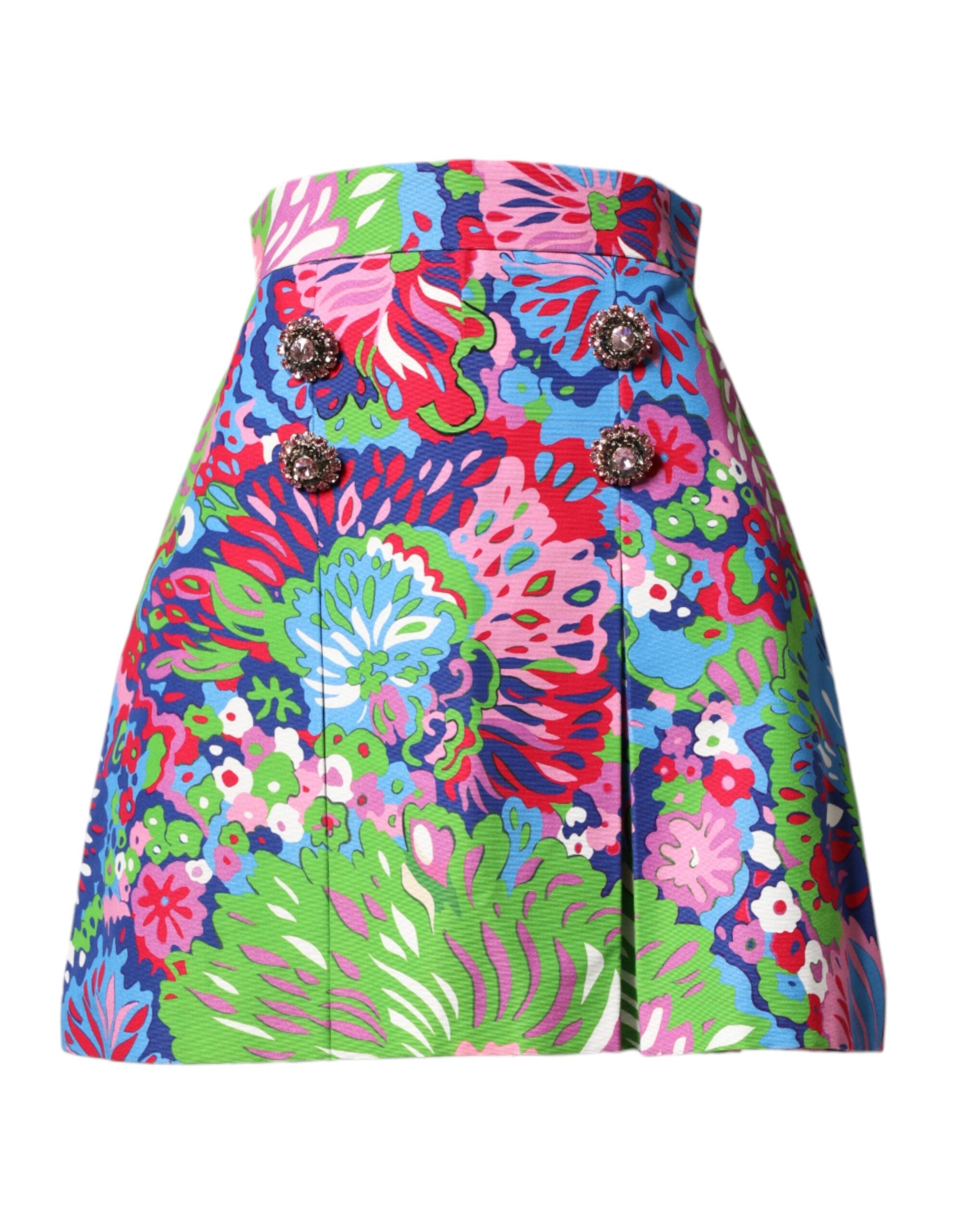 Short skirt with colorful floral print and decorative metal buttons viewed from front