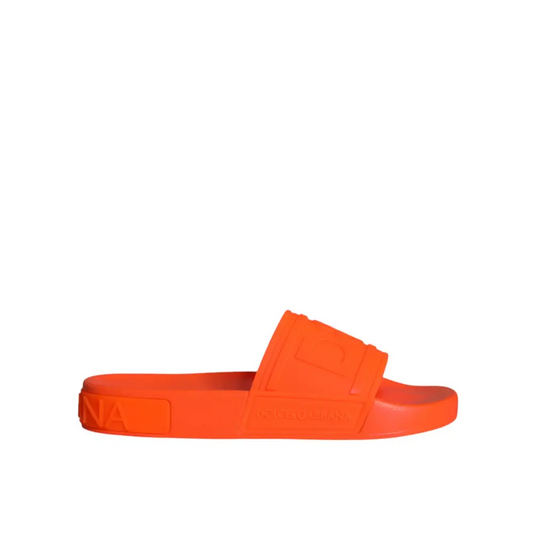 Vibrante orange rubber slide sandal med Dolce & Gabbana logo på stropp og sål
