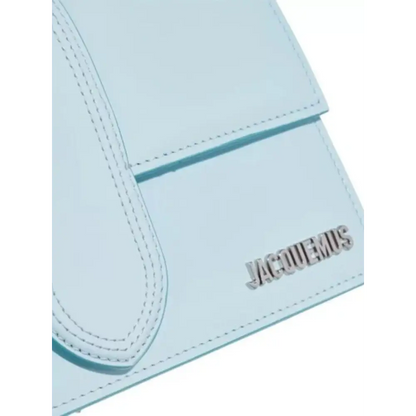 Lyst blå læder clutch med Jacquemus-logo og Grand Bambino-design