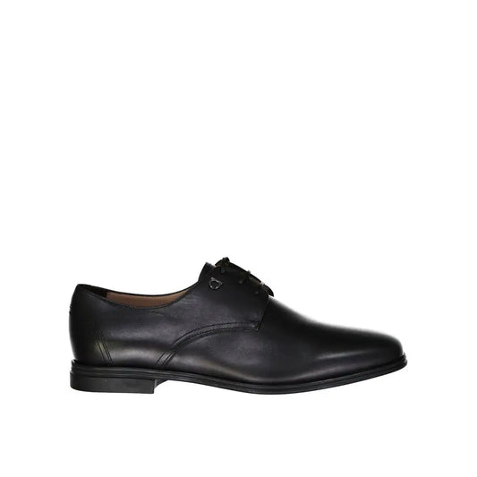 Salvatore Ferragamo black calfskin oxfords and derbies, polished leather derby